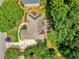 Aerial view of property with mature trees, lush lawn, and pristine landscaping at 3795 Newport Bay Dr, Alpharetta, GA 30005