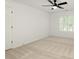 Bedroom offering neutral carpet, bright windows with shutters, and a ceiling fan at 3795 Newport Bay Dr, Alpharetta, GA 30005