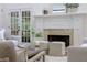 Close-up of the fireplace in the elegant living room at 3795 Newport Bay Dr, Alpharetta, GA 30005