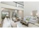 Bright living room that leads to the dining room and kitchen at 3795 Newport Bay Dr, Alpharetta, GA 30005
