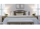 Relaxing main bedroom featuring a cozy bed, neutral decor, side tables, and bright windows at 3795 Newport Bay Dr, Alpharetta, GA 30005