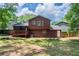 A spacious backyard with a wooden deck, offering a great outdoor space at 5207 Shawn Ln, Stone Mountain, GA 30088