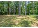 A large grassy backyard area, perfect for outdoor activities and relaxation at 5207 Shawn Ln, Stone Mountain, GA 30088