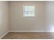 Bedroom featuring neutral walls, carpet flooring, and a window with blinds at 5207 Shawn Ln, Stone Mountain, GA 30088
