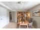 Functional office space with built-in bookshelves, carpeted floor, and natural light at 5207 Shawn Ln, Stone Mountain, GA 30088