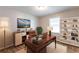 Functional office space with a desk, chair, and shelving, perfect for a productive work environment at 1105 Buckhurst Dr, Atlanta, GA 30349