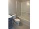 Bathroom featuring a shower, tub, toilet, and modern vanity at 1250 Winterhaven Dr, Cumming, GA 30041