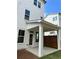 Covered patio features white columns and a wooden privacy screen, great for enjoying the outdoors at 1250 Winterhaven Dr, Cumming, GA 30041