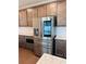 Stainless steel Samsung refrigerator with digital display and built-in ice and water dispenser at 1250 Winterhaven Dr, Cumming, GA 30041