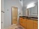 Bathroom with glass shower, tub, and wood cabinets at 195 Arizona Ne Ave # 199, Atlanta, GA 30307
