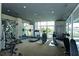 Fitness center with a variety of exercise equipment and floor to ceiling windows at 195 Arizona Ne Ave # 199, Atlanta, GA 30307