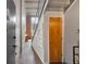 Hallway featuring high ceilings, exposed ductwork, and a decorative staircase at 195 Arizona Ne Ave # 199, Atlanta, GA 30307
