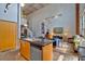 Modern kitchen with stainless steel appliances, island with sink, and open layout to the living area at 195 Arizona Ne Ave # 199, Atlanta, GA 30307