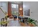 Bright living room with exposed brick wall, high ceilings, and modern decor at 195 Arizona Ne Ave # 199, Atlanta, GA 30307