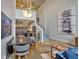 Open-concept living and dining area with modern furniture and a staircase leading to a loft at 195 Arizona Ne Ave # 199, Atlanta, GA 30307