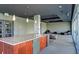 Stylish lounge area featuring a modern kitchen with granite countertops, seating and an open layout at 195 Arizona Ne Ave # 199, Atlanta, GA 30307