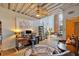Spacious open-concept workspace with a desk and leather armchairs at 195 Arizona Ne Ave # 199, Atlanta, GA 30307