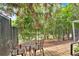 Peaceful stone patio featuring table, chairs, and a lush wooded backdrop at 195 Arizona Ne Ave # 199, Atlanta, GA 30307