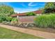 Exterior shot of Arizona Lofts signage amidst lush landscaping at 195 Arizona Ne Ave # 199, Atlanta, GA 30307