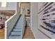 Modern staircase with metal railings leading to the upper level at 195 Arizona Ne Ave # 199, Atlanta, GA 30307