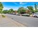 Street view of a brick building with greenery and street parking at 195 Arizona Ne Ave # 199, Atlanta, GA 30307