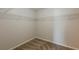Walk-in closet featuring carpeted floors and wire shelving at 440 Pinevale Ct, Atlanta, GA 30349