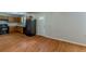 Picture of kitchen featuring wood cabinets, a refrigerator, and a door to the adjacent room at 440 Pinevale Ct, Atlanta, GA 30349
