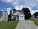 Charming single-Gathering home featuring a well-manicured lawn, neutral siding, and a cozy one-car garage at 133 Magazine St, Dallas, GA 30157