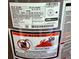 Close-up of a water heater label detailing specifications, warnings, and safety information at 133 Magazine St, Dallas, GA 30157