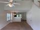The spacious living room has a vaulted ceiling and is open to the kitchen at 133 Magazine St, Dallas, GA 30157