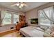 Comfortable bedroom with hardwood floors and natural light at 3229 Richwood Dr, Duluth, GA 30096