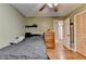 Cozy bedroom features hardwood floors and natural light at 3229 Richwood Dr, Duluth, GA 30096