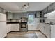 Kitchen featuring stainless steel appliances, window over sink and ample counter space at 3229 Richwood Dr, Duluth, GA 30096