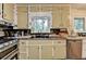 Functional kitchen features stainless steel appliances and garden view windows at 3229 Richwood Dr, Duluth, GA 30096
