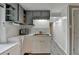 View of the kitchen showcasing stainless steel appliances and tiled countertops at 3229 Richwood Dr, Duluth, GA 30096