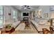 Spacious living room with hardwood floors, comfortable seating, and a cozy rug for a relaxing ambiance at 3229 Richwood Dr, Duluth, GA 30096