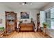 Cozy living room featuring hardwood floors, ample natural light, and classic furnishings for a comfortable feel at 3229 Richwood Dr, Duluth, GA 30096