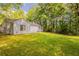 This backyard features a lush green lawn and plenty of space at 6200 Beaver Creek Trl, Atlanta, GA 30349