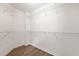 Walk-in closet with wood floors and wire shelving at 213 Riverstone Commons Cir, Canton, GA 30114