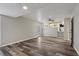 Basement featuring wood-look floors, neutral paint, and an open floorplan at 2849 Snapfinger Rd, Decatur, GA 30034