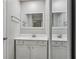 Bathroom with a double sink vanity, updated fixtures and mirror at 2849 Snapfinger Rd, Decatur, GA 30034