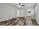 Bright bedroom featuring wood-look floors, neutral paint, and a closet at 2849 Snapfinger Rd, Decatur, GA 30034