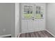 Bright entryway with white double doors and light wood grain vinyl plank flooring at 2849 Snapfinger Rd, Decatur, GA 30034