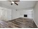 Spacious living room with a fireplace and modern flooring at 2849 Snapfinger Rd, Decatur, GA 30034