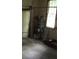 Interior shot of a garage, highlighting its storage potential and natural light from the window at 340 Sherwood Se Cir, Conyers, GA 30094