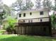 Backyard featuring a spacious deck, showcasing the outdoor living space of the home at 340 Sherwood Se Cir, Conyers, GA 30094