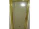 A translucent shower door with gold trim obscures the view into the shower at 340 Sherwood Se Cir, Conyers, GA 30094