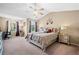 Spacious primary bedroom with vaulted ceilings and ensuite bathroom at 44 Providence Oak Ct, Lawrenceville, GA 30046