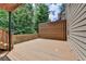 Wood back deck provides backyard access to the property from the house at 5245 Cottage Farm Rd, Johns Creek, GA 30022