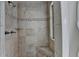 The bathroom features a shower with tile and a built in seat at 5245 Cottage Farm Rd, Johns Creek, GA 30022